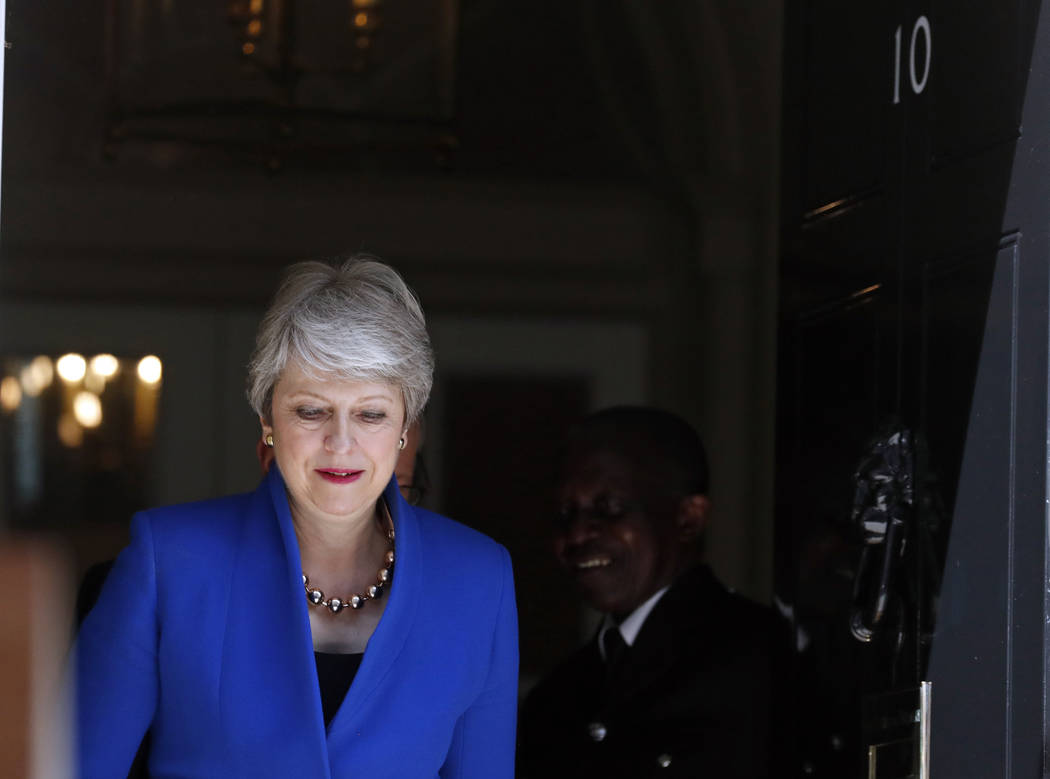 Britain's Prime Minister Theresa May arrives to speak outside 10 Downing Street, London before ...