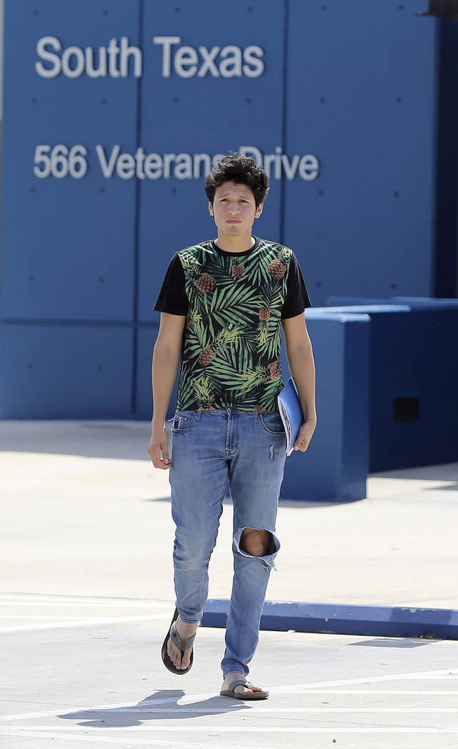 U.S. citizen Francisco Galicia, 18, walks out on his own from the South Texas Detention Facilit ...