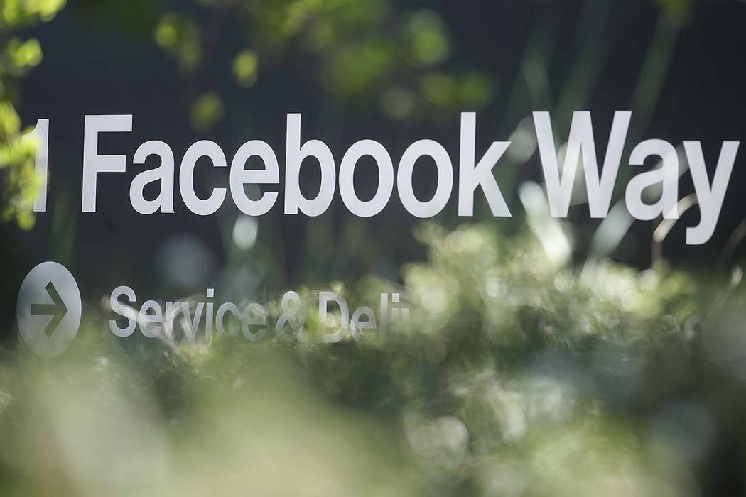 An April 25, 2019, file photo shows an address sign for Facebook Way in Menlo Park, Calif. (AP ...