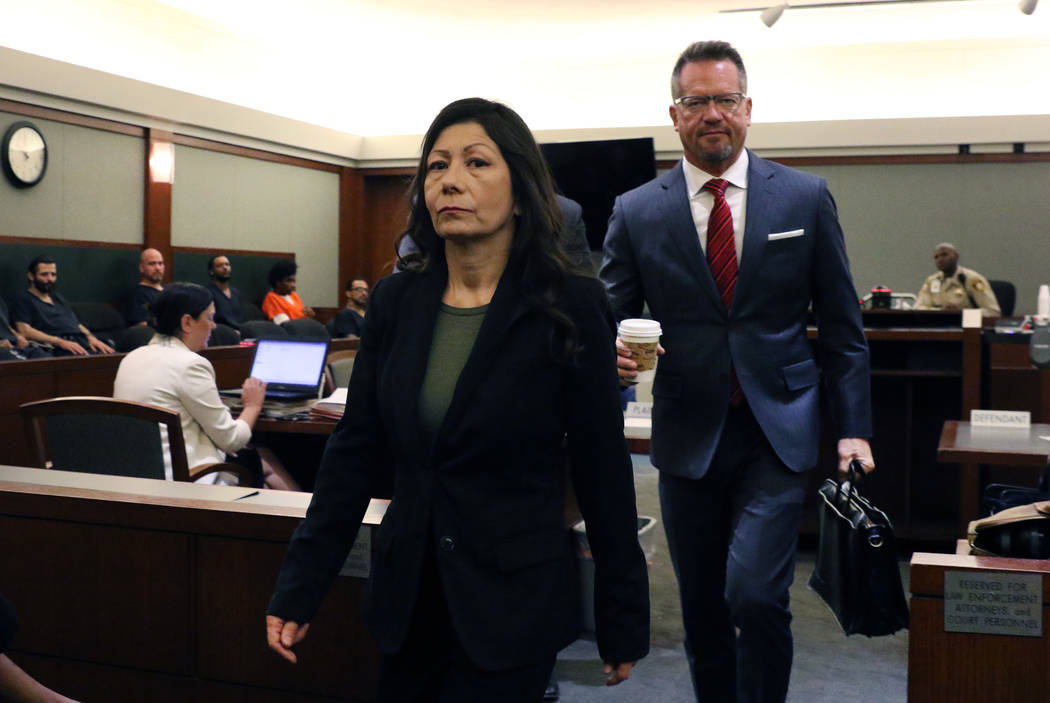 Former Las Vegas Police detective Pamela Bordeaux and her attorney Robert Draskovich leave the ...