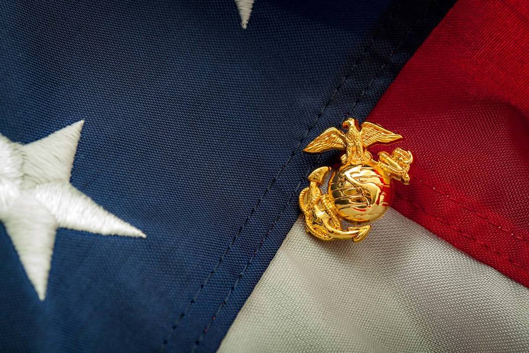 Image of the U.S. Marine Corps emblem on the American flag. (Getty Images)