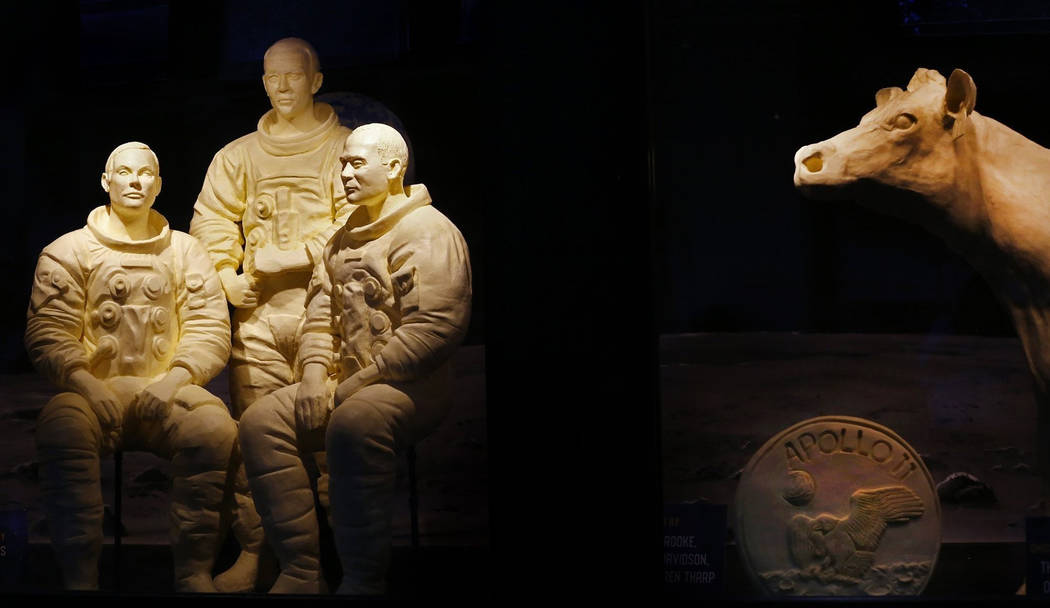 This Tuesday, July 23, 2019, photo shows a sculpture of Apollo 11 astronauts and the butter cow ...