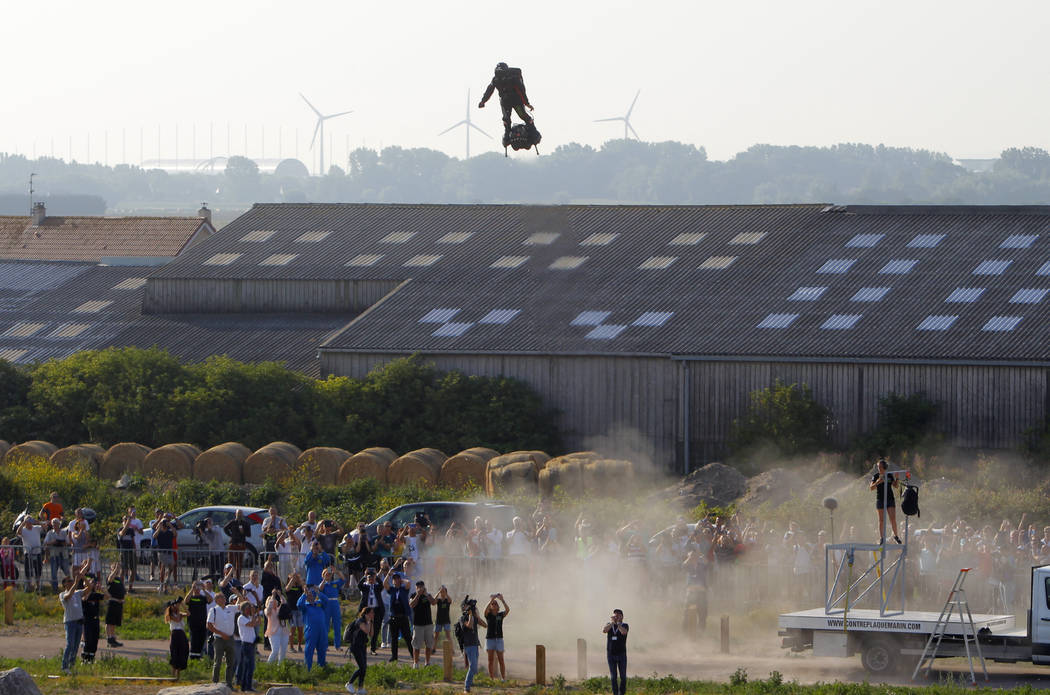 Franky Zapata, a 40-year-old inventor, takes to the air in Sangatte, Northern France, at the st ...