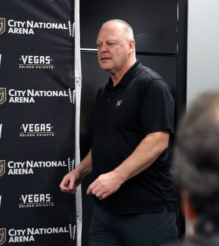 Golden Knights coach Gerard Gallant enters the press room to address the media at City National ...