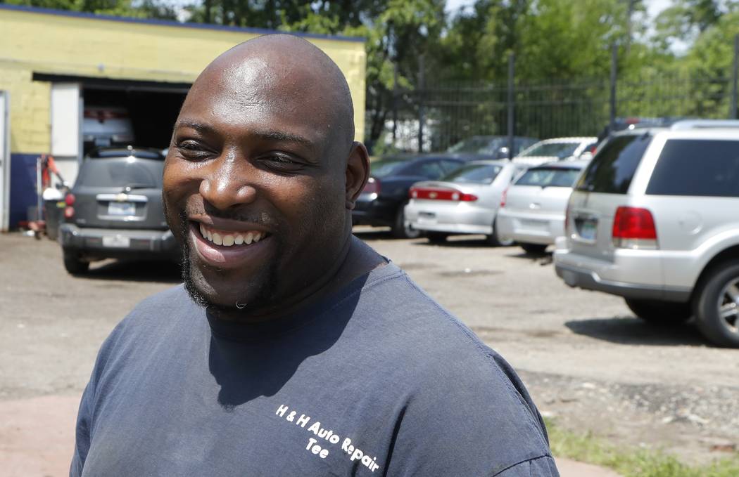 In a July 23, 2019, photo, auto repairman Terrance Holmes is interviewed in Detroit. When Barac ...