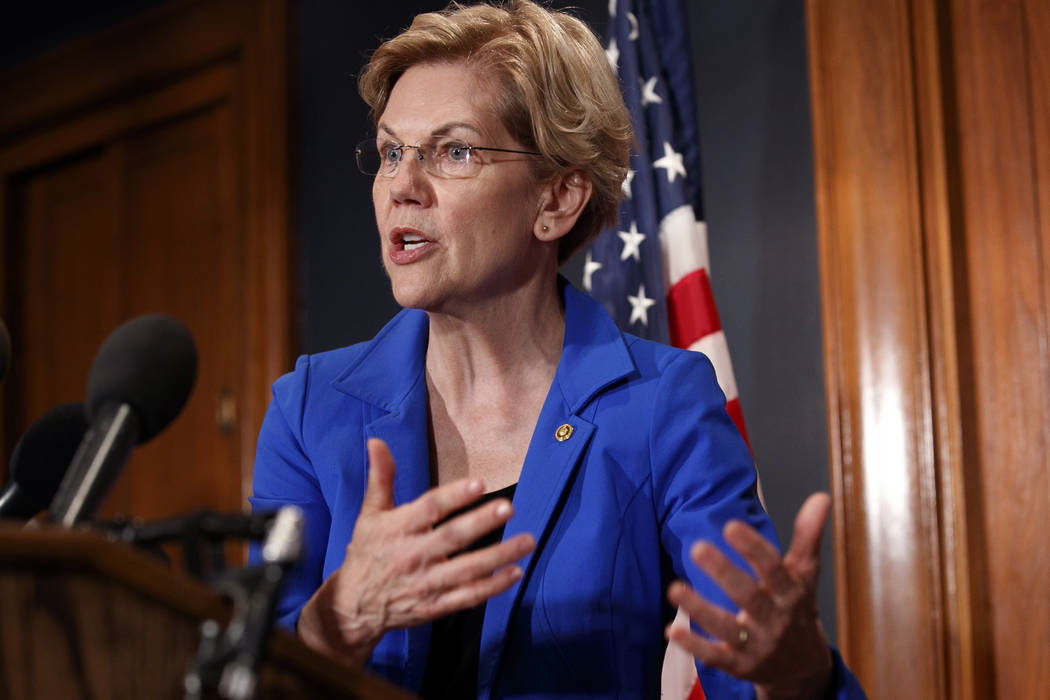 Sen. Elizabeth Warren, D-Mass., speaks about a bill to cancel student loan debt, Tuesday, July ...