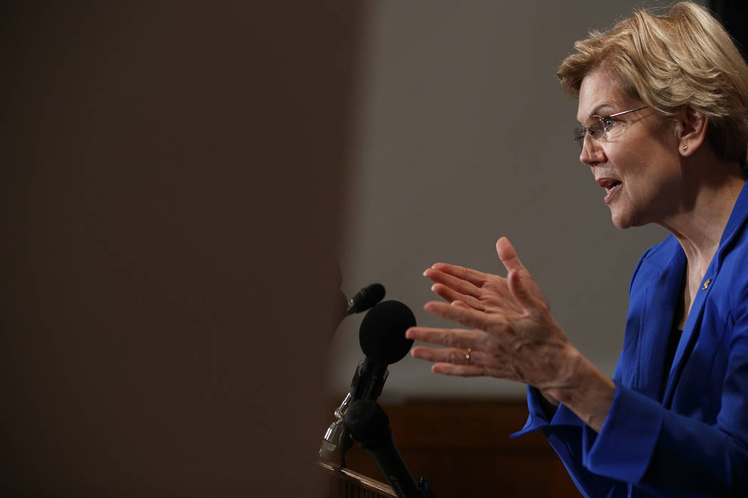 Sen. Elizabeth Warren, D-Mass., speaks about a bill to cancel student loan debt, Tuesday, July ...