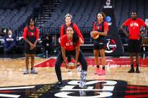 Las Vegas Aces' A'ja Wilson attempts a half-court shot during practice ahead of the WNBA All-St ...