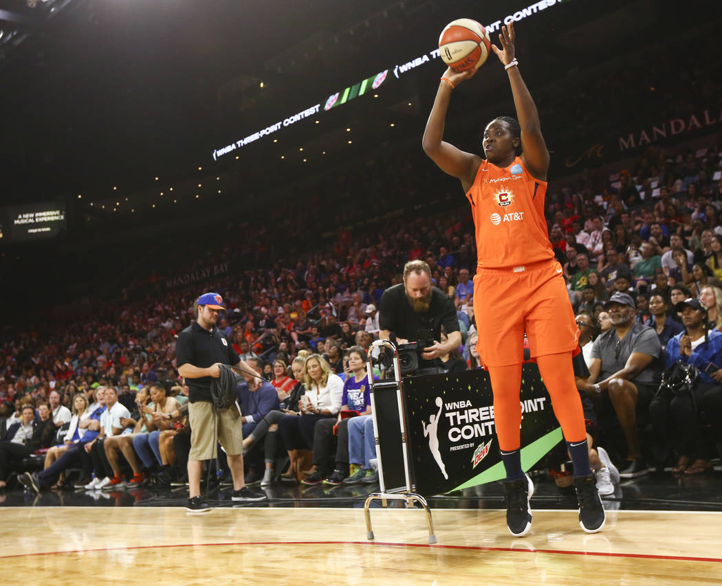 Connecticut Sun's Shekinna Stricklen competes in the 3-point shooting challenge during the WNBA ...