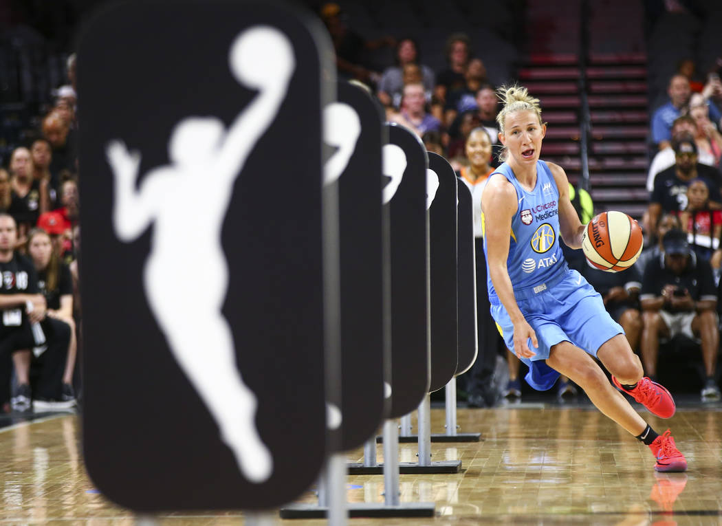 Chicago Sky's Courtney Vandersloot competes in an obstacle course involving passing and shootin ...