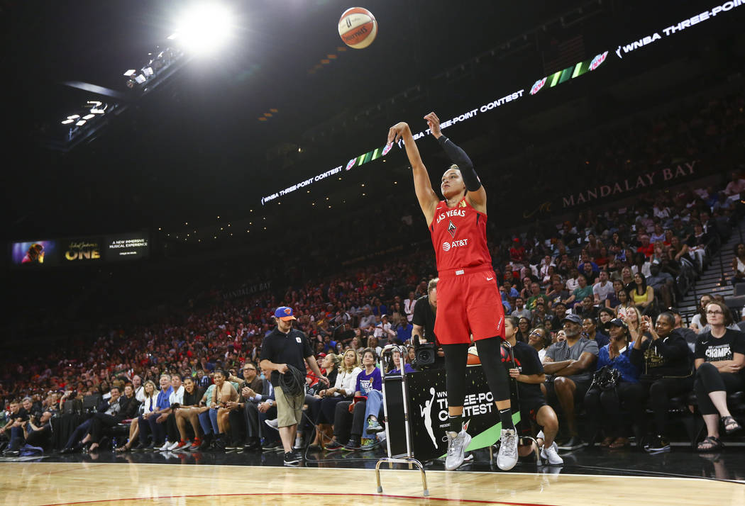 Las Vegas Aces' Kayla McBride competes in the 3-point shooting challenge during the WNBA All-St ...