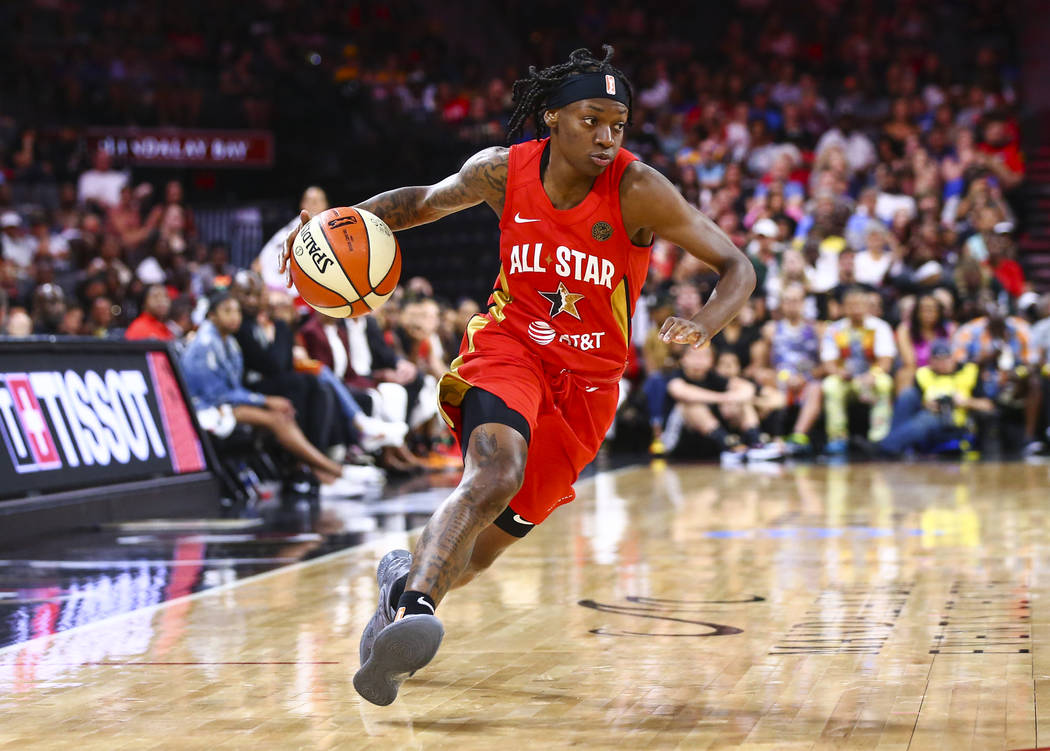 Indiana Fever's Erica Wheeler drives to the basket during the second half of the WNBA All-Star ...