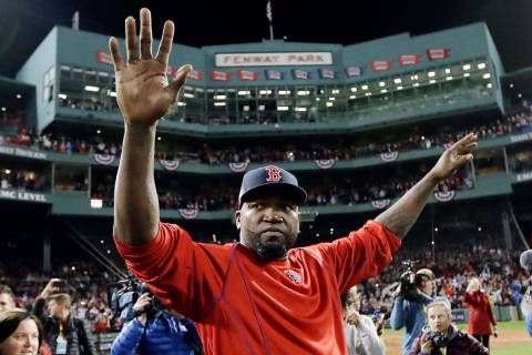 In this Oct. 10, 2016, file photo, Boston Red Sox's David Ortiz waves from the field at Fenway ...