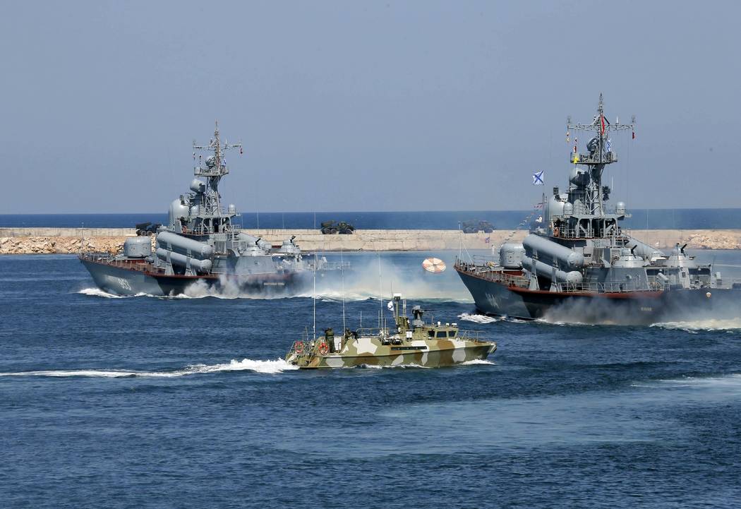 Russian missile boats attend the military parade during the Navy Day celebration in the Black S ...