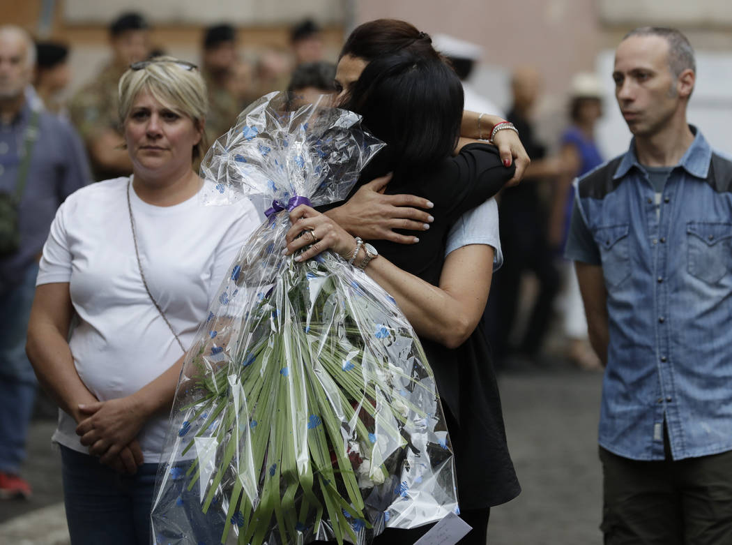 People arrive to pay respect in the church where Carabinieri officer Mario Cerciello Rega was l ...