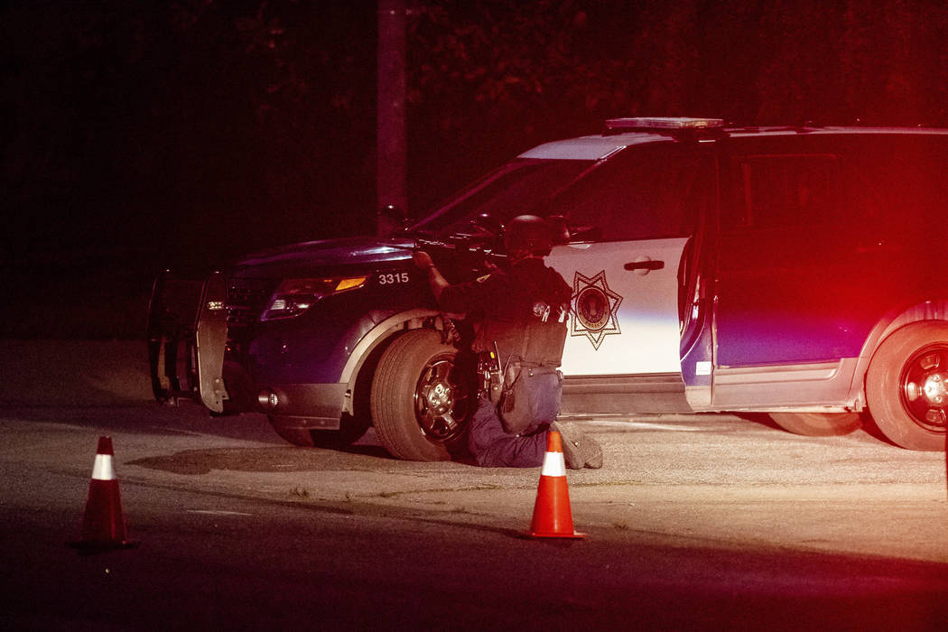 Police stay focused on a target after a deadly shooting at the Gilroy Garlic Festival in Gilroy ...