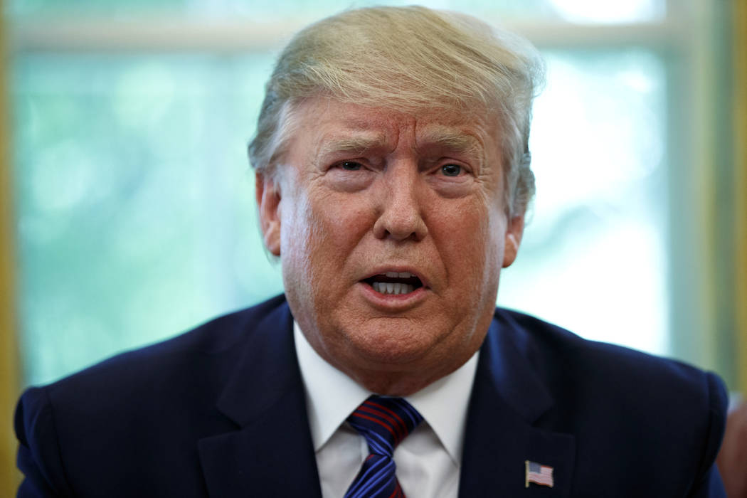 President Donald Trump speaks in the Oval Office of the White House in Washington, Friday, July ...