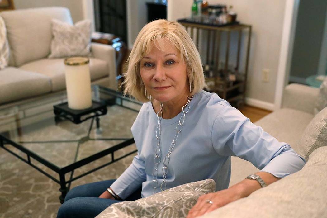 Cancer patient Kim Lauerman poses for a portrait in her home Wednesday, June 26, 2019, in Alpha ...