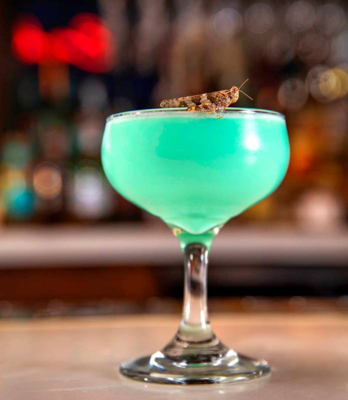 Grasshopper drink with grasshopper on the rim prepared by bartender Sarah Contois at the Smashe ...