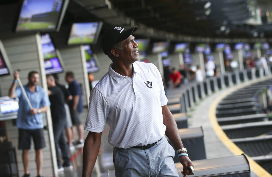 Former Oakland Raiders cornerback Mike Haynes watches his shot during the Raiders Foundation &q ...