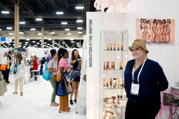 Owner and CEO of Melanie Mills Hollywood, Melanie Mills, right, at her booth at Cosmoprof North ...