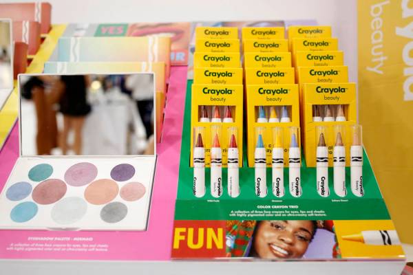 Crayola Beauty displays their vibrant face crayons, lip and cheek crayons and different palette ...
