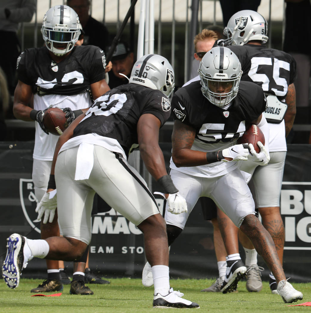 Oakland Raiders linebacker Nicholas Morrow (50) comes in to tackle inside linebacker Brandon Ma ...