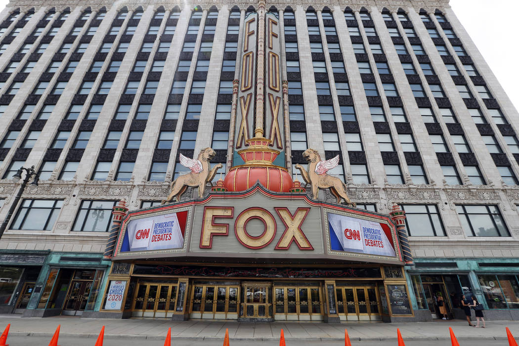 The marquee at the Fox Theatre displays signs for the Democratic presidential debates in Detroi ...