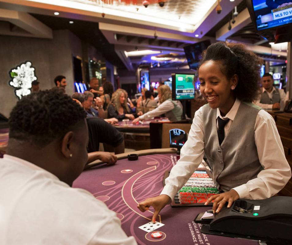 Gambers play blackjack at SLS Las Vegas on Thursday, May, 30, 2019, in Las Vegas. (Benjamin Hag ...