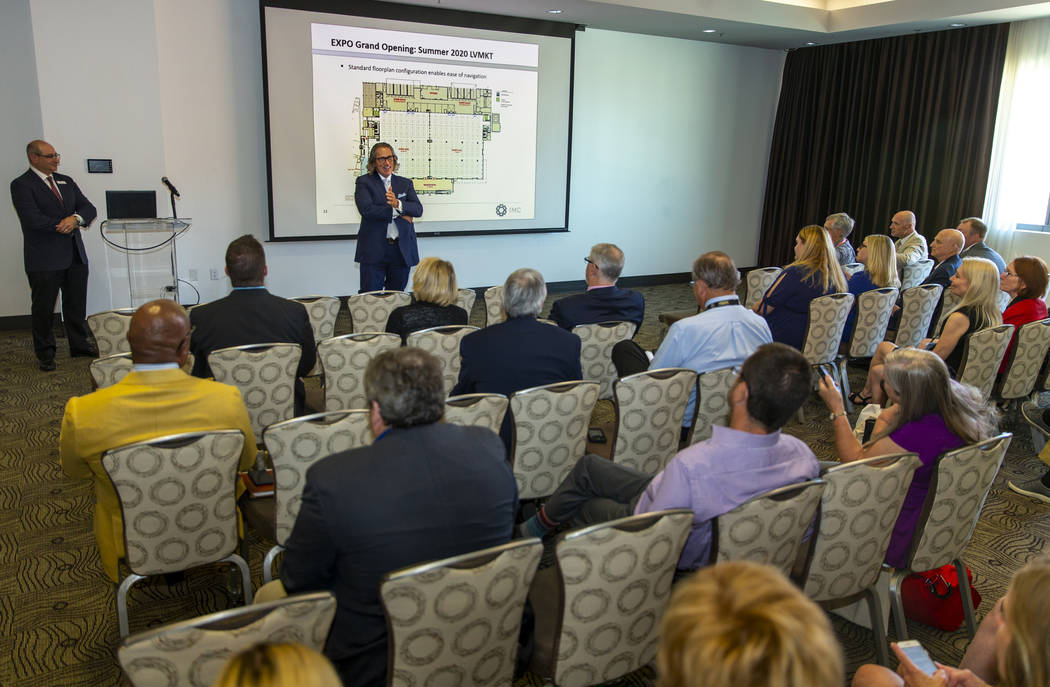 CEO Bob Maricich with the International Market Centers, center, speaks during a press conferenc ...