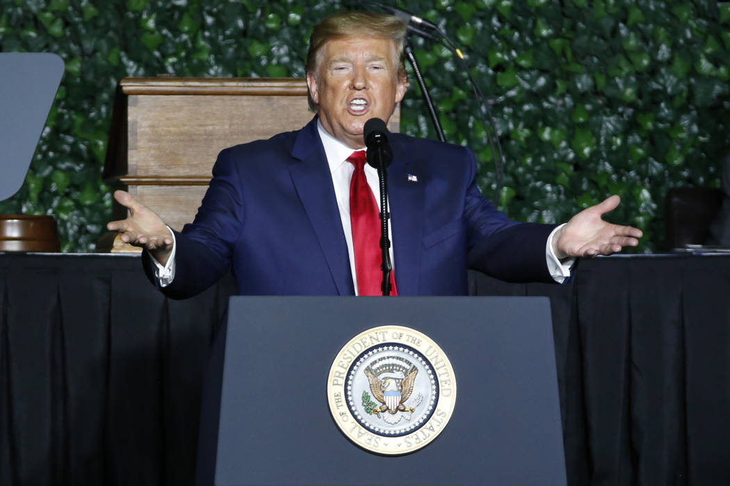 President Donald Trump gestures as he addresses a commemorative meeting of the Virginia General ...