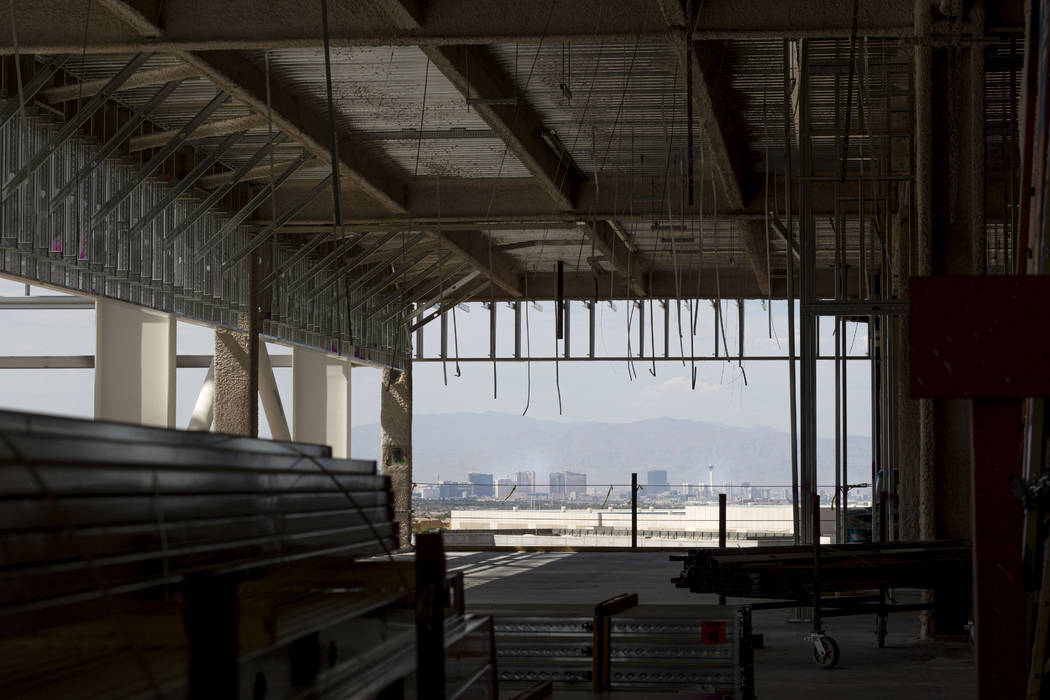 A view of the Las Vegas Strip is seen at the Raiders' headquarters construction site in Henders ...