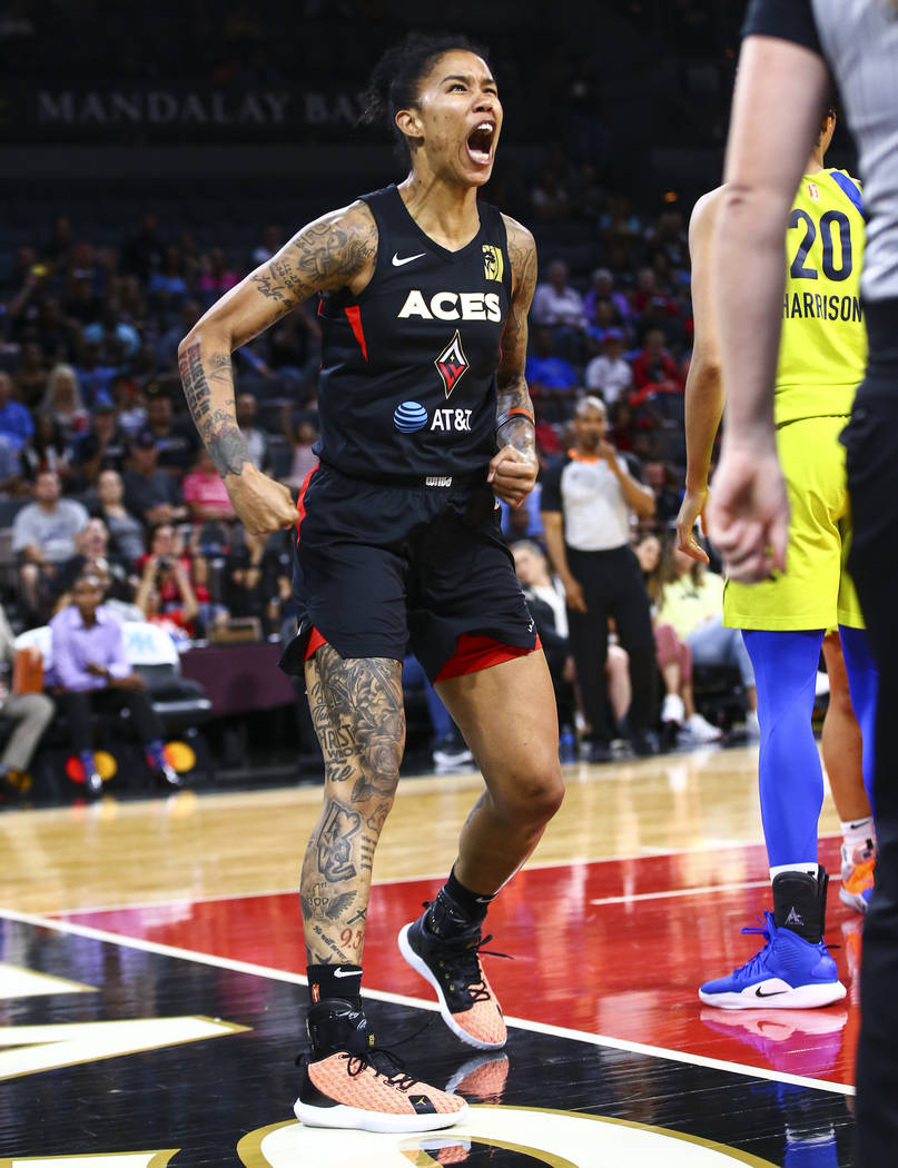 Las Vegas Aces' Tamera Young reacts after scoring against the Dallas Wings during the second ha ...