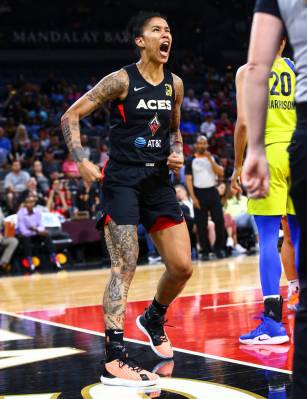 Las Vegas Aces' Tamera Young reacts after scoring against the Dallas Wings during the second ha ...