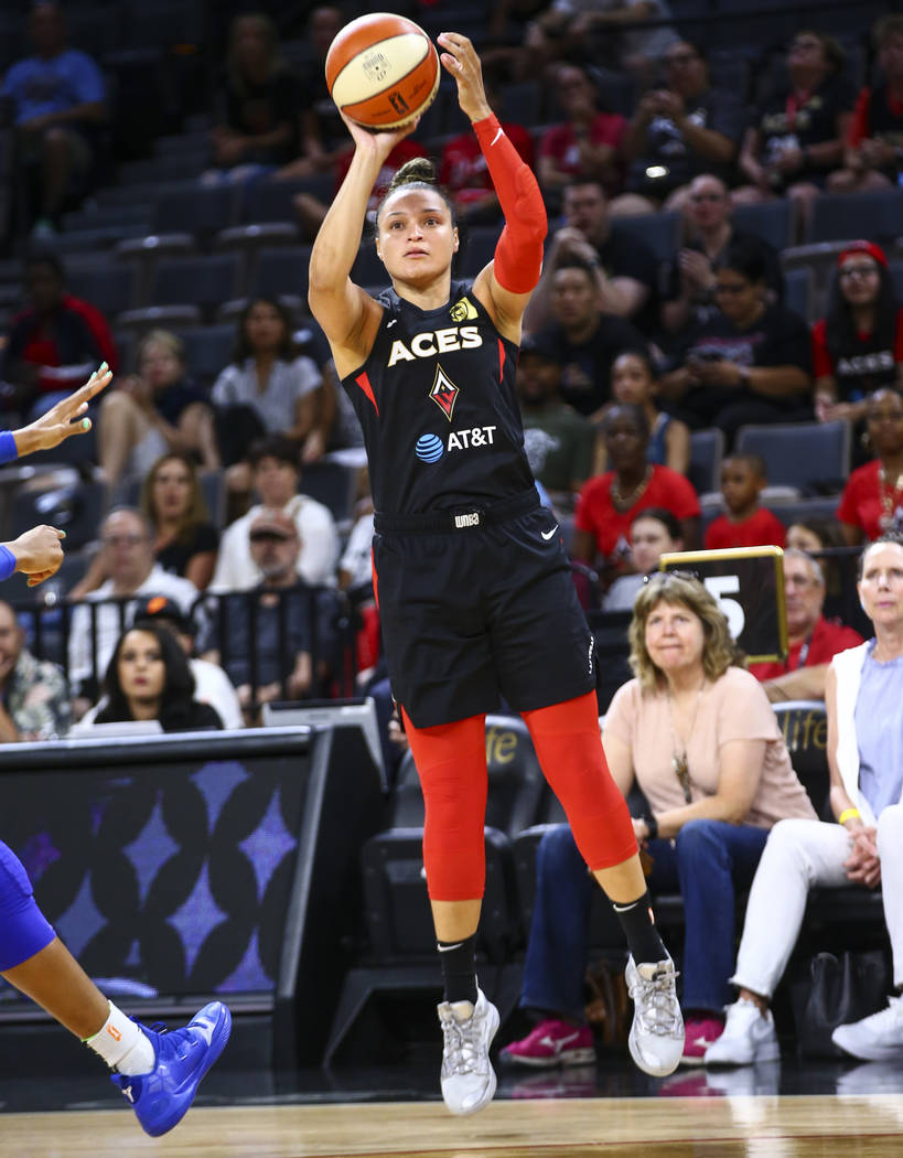 Las Vegas Aces' Kayla McBride shoots against the Dallas Wings during the first half of a WNBA b ...