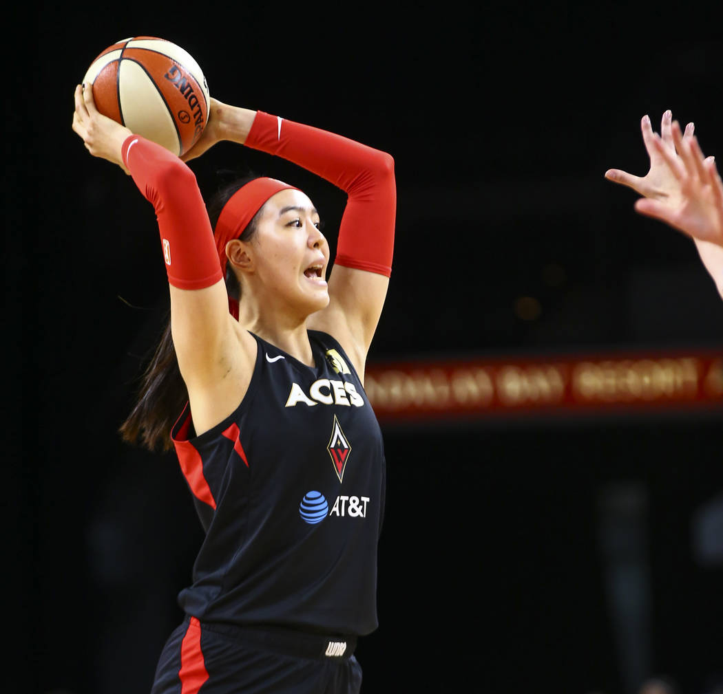 Las Vegas Aces' Ji-Su Park (19) looks to pass the ball during the first half of a WNBA basketba ...