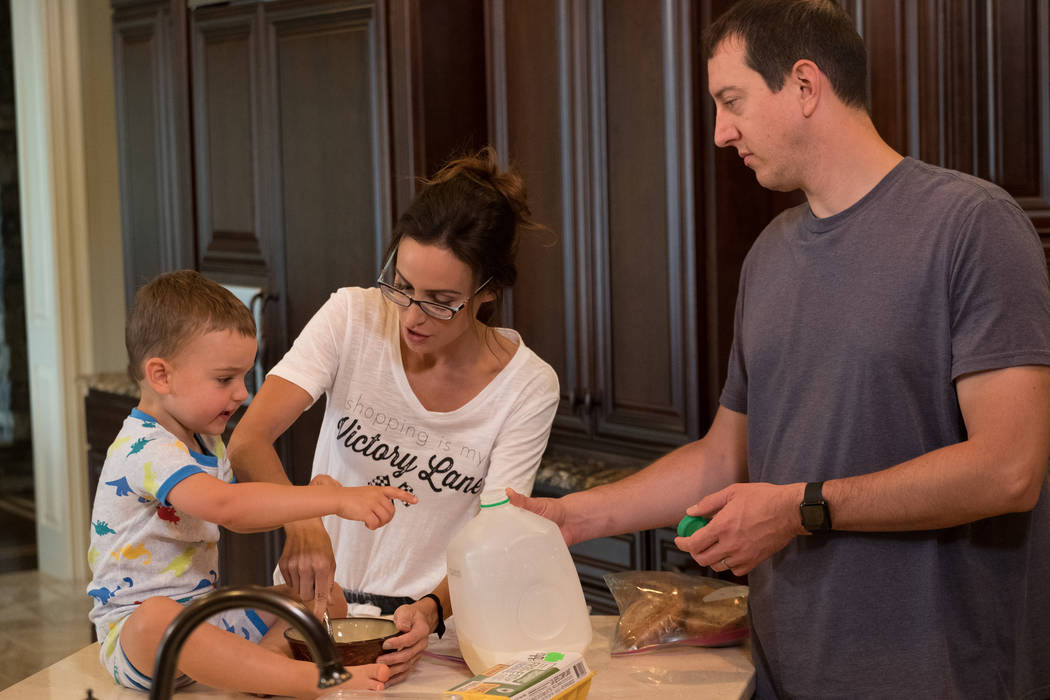 Samantha and Kyle Busch and their son, Brexton, from "Racing Wives." (CMT)
