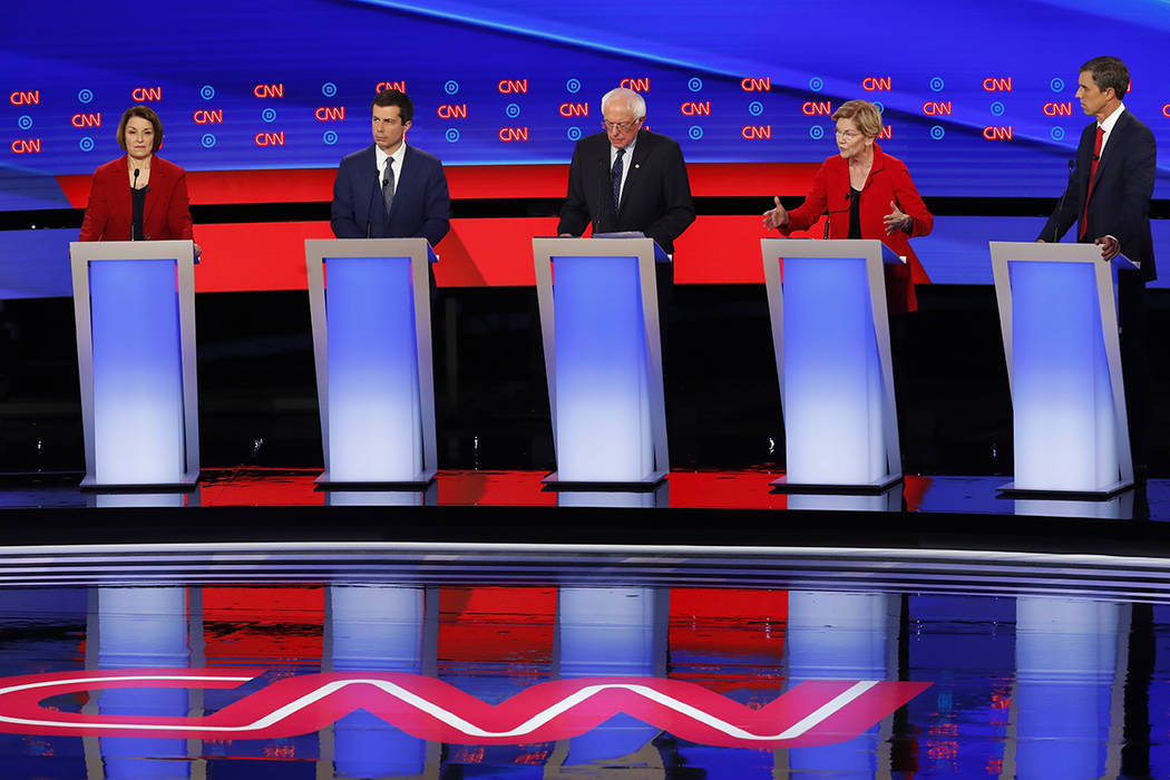 From left, Sen. Amy Klobuchar, D-Minn., South Bend Mayor Pete Buttigieg, Sen. Bernie Sanders, I ...