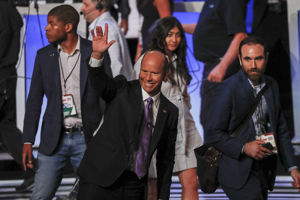 Former Maryland Rep. John Delaney waves after the first of two Democratic presidential primary ...