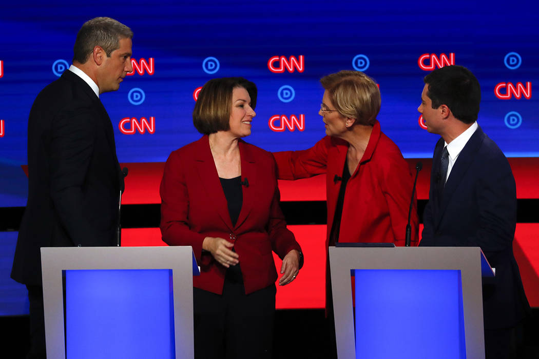 From left, Rep. Tim Ryan, D-Ohio, Sen. Amy Klobuchar, D-Minn., Sen. Elizabeth Warren, D-Mass., ...