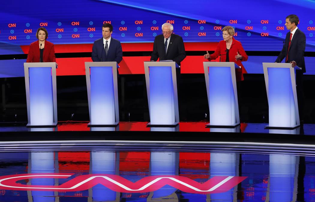 From left, Sen. Amy Klobuchar, D-Minn., South Bend Mayor Pete Buttigieg, Sen. Bernie Sanders, I ...