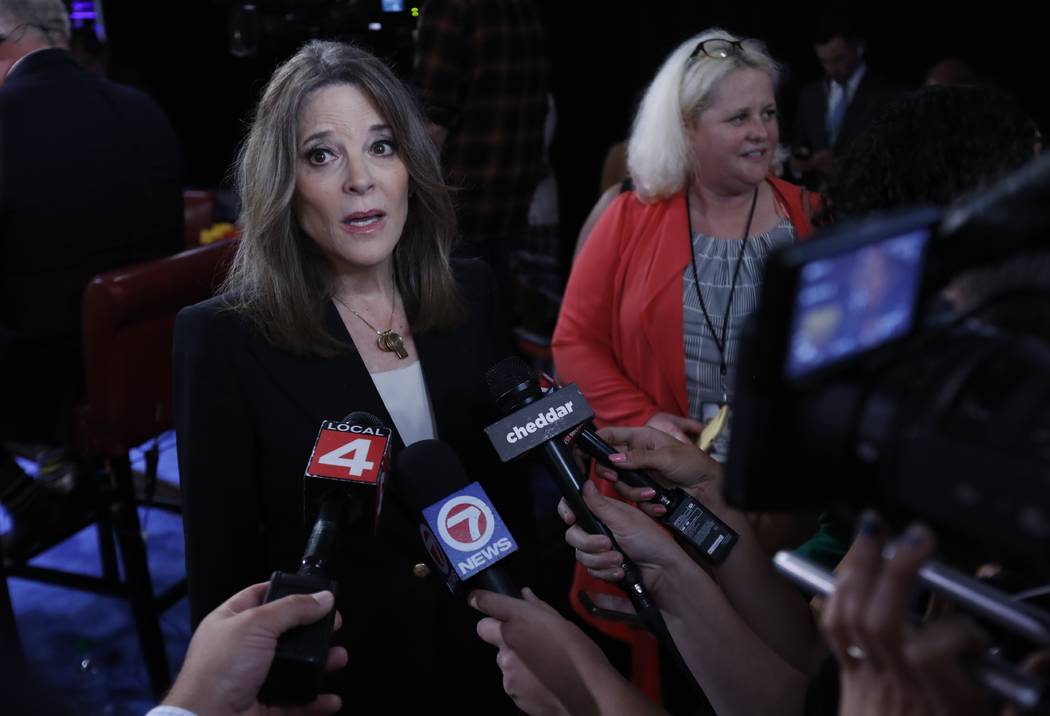 Marianne Williamson talks to reporters after the first of two Democratic presidential primary d ...