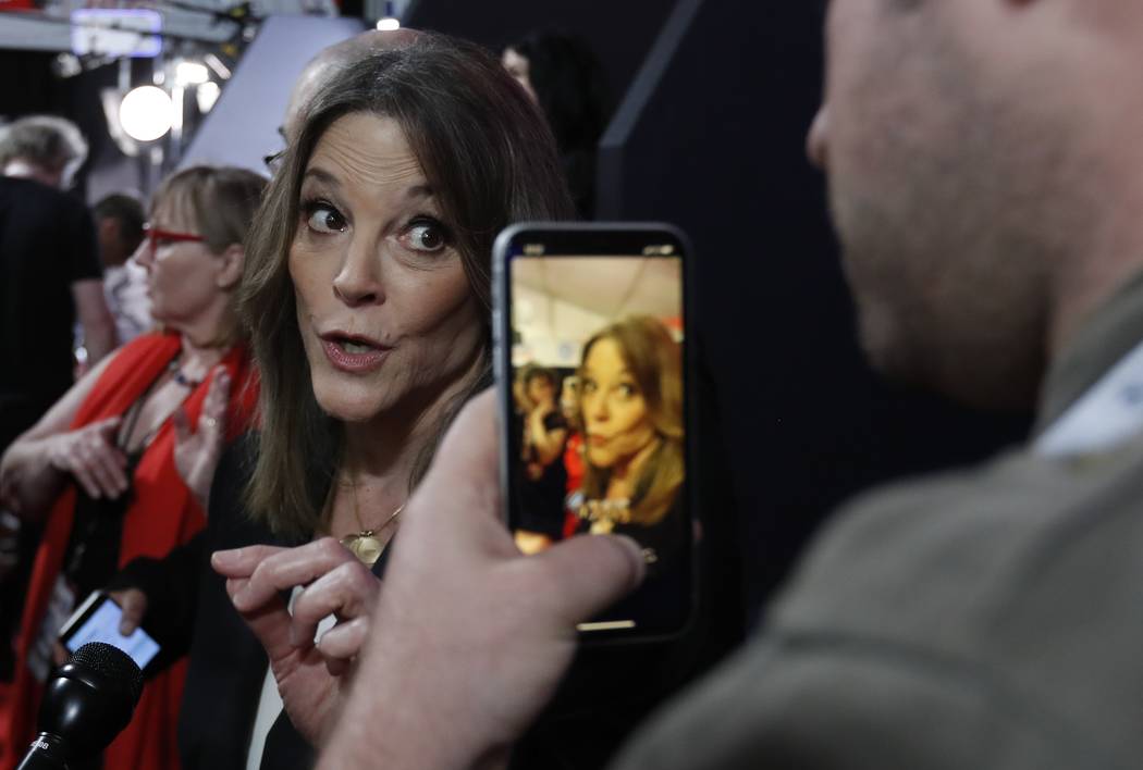 Marianne Williamson talks to reporters after the first of two Democratic presidential primary d ...