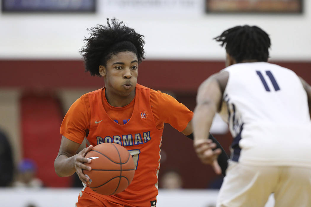 Bishop Gorman's Zaon Collins #10 in action against La Lumiere's Wendell Green (11) in a Boys Qu ...