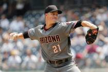 Arizona Diamondbacks' Zack Greinke delivers a pitch during the first inning of a baseball game ...