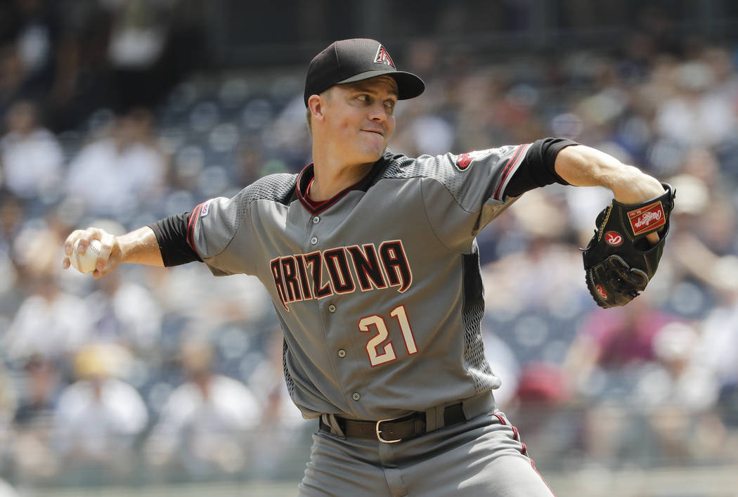 Arizona Diamondbacks' Zack Greinke delivers a pitch during the first inning of a baseball game ...