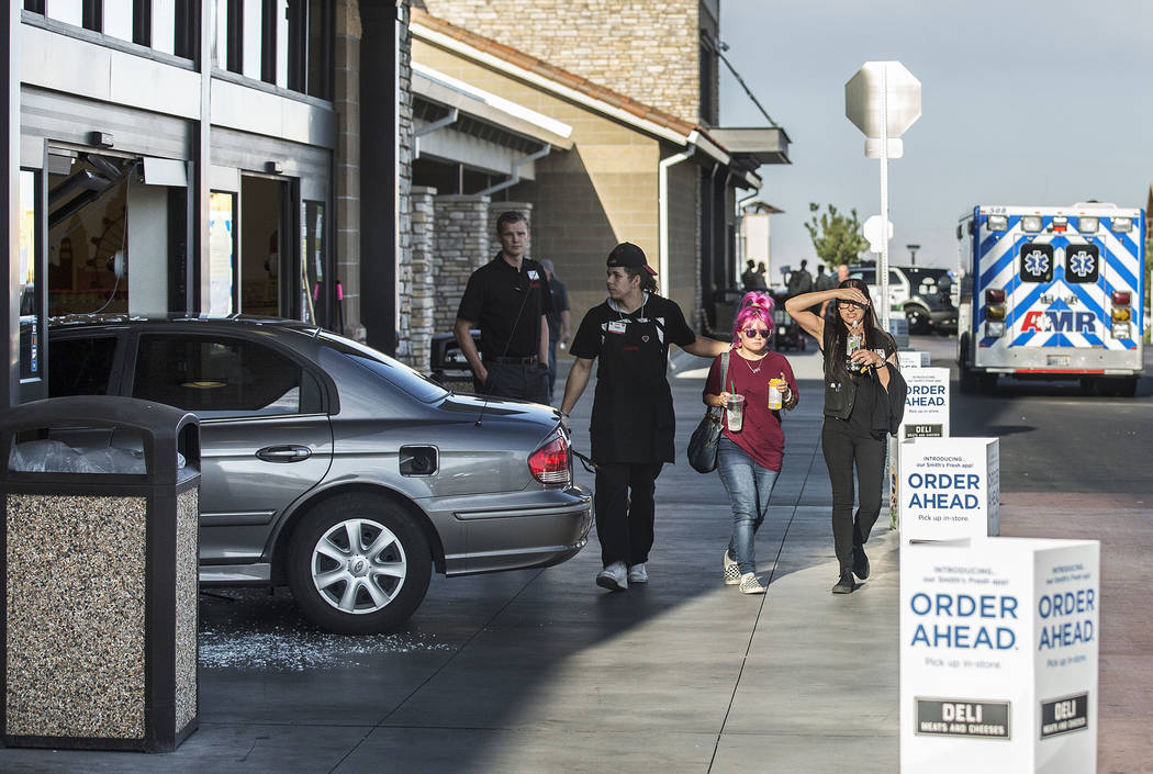 A car crashes into the Smith’s Marketplace, at 9710 West Skye Canyon Park Drive, Wednesd ...