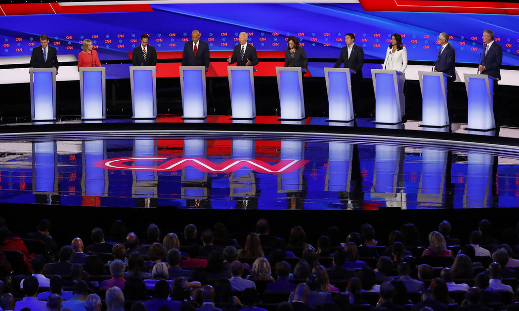 From left, Sen. Michael Bennet, D-Colo., Sen. Kirsten Gillibrand, D-N.Y., former Housing and Ur ...