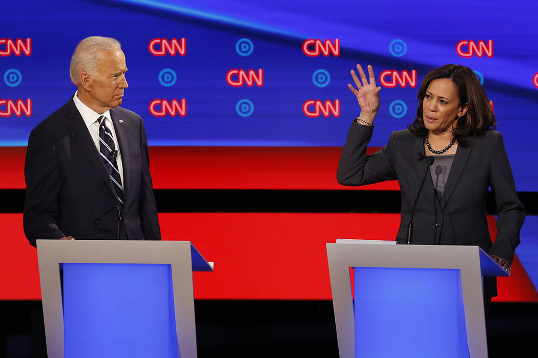 Sen. Kamala Harris, D-Calif., speaks as former Vice President Joe Biden listens during the seco ...