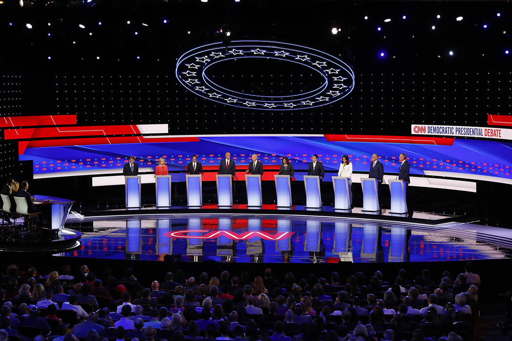 From left, Sen. Michael Bennet, D-Colo., Sen. Kirsten Gillibrand, D-N.Y., former Housing and Ur ...